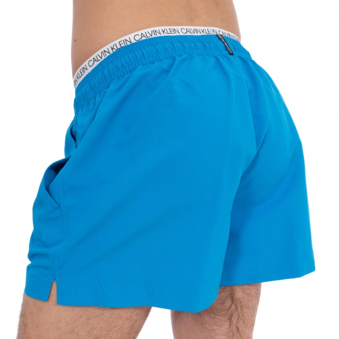  Short de bain court avec double ceinture - Bleu Ibiza - CALVIN KLEIN KM0KM00310-439 