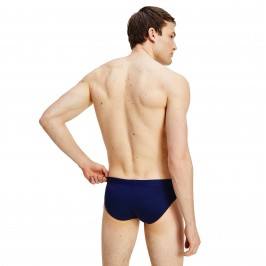  Bañador slip liso hecho de nailon reciclado Tommy - navy - TOMMY HILFIGER UM0UM02102-DW5 