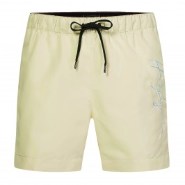 Mid-length swim shorts Tommy  with signature logo - yellow - TOMMY HILFIGER *UM0UM02299-ZI9